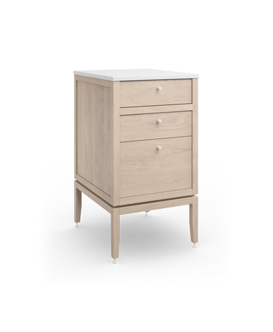 Coquo modular bathroom vanity with three drawers in white stained oak. 